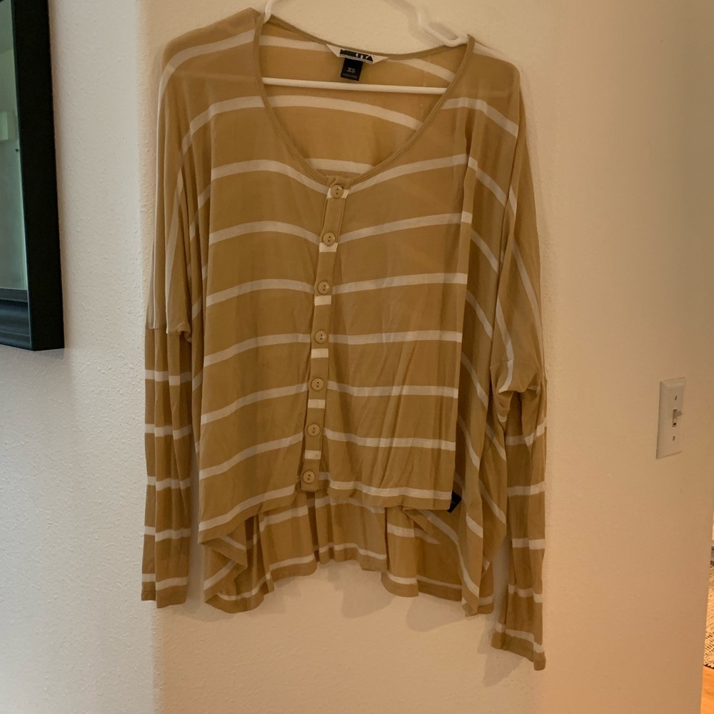 Woman’s yellow striped sweater